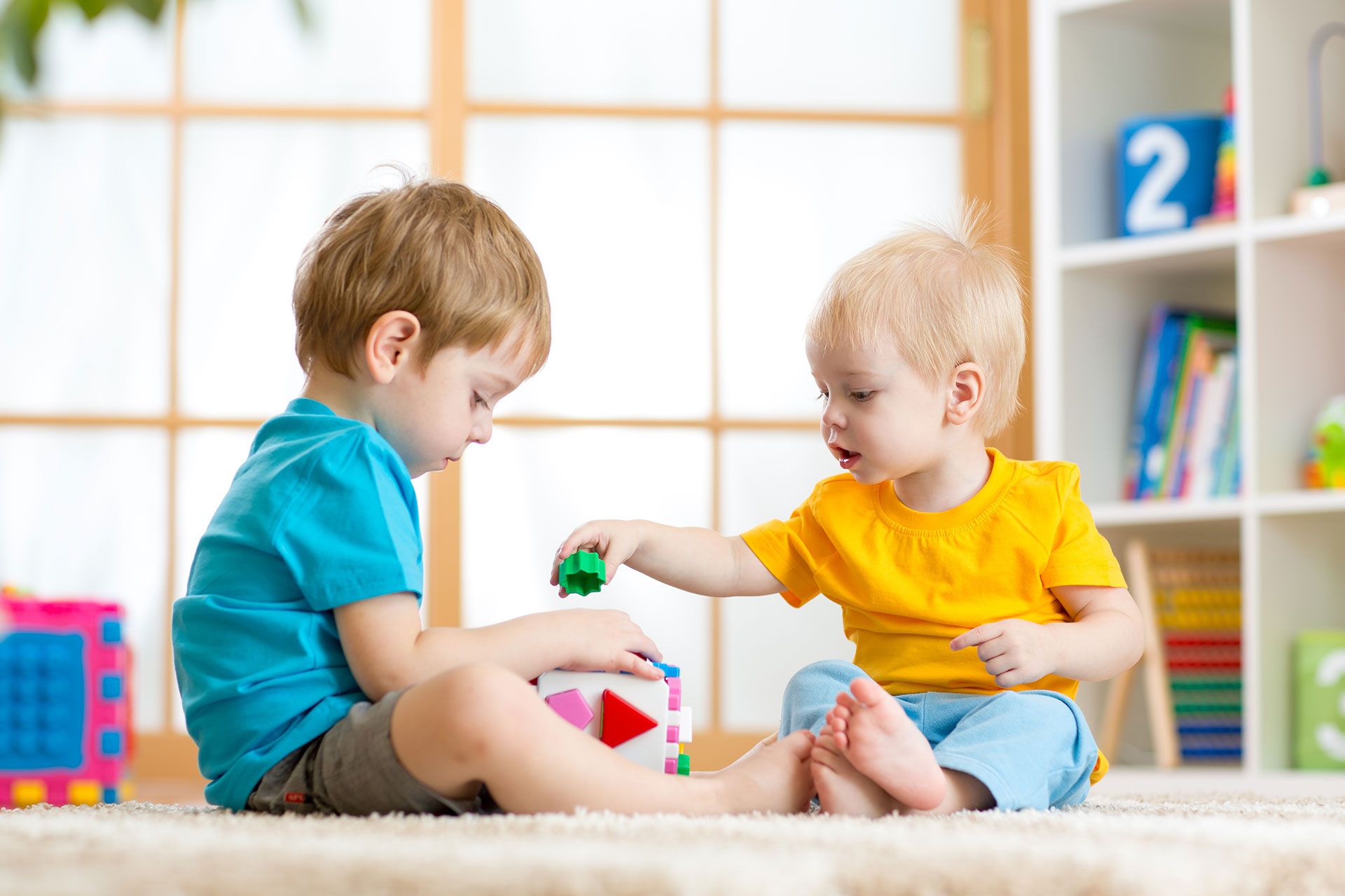 Therapist working with an infant during early intervention session